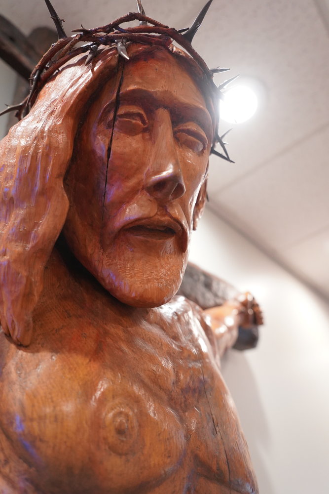 This is the live-size crucifix Hannibal parishioner Delbert Hayes carved for display in Holy Family Church.